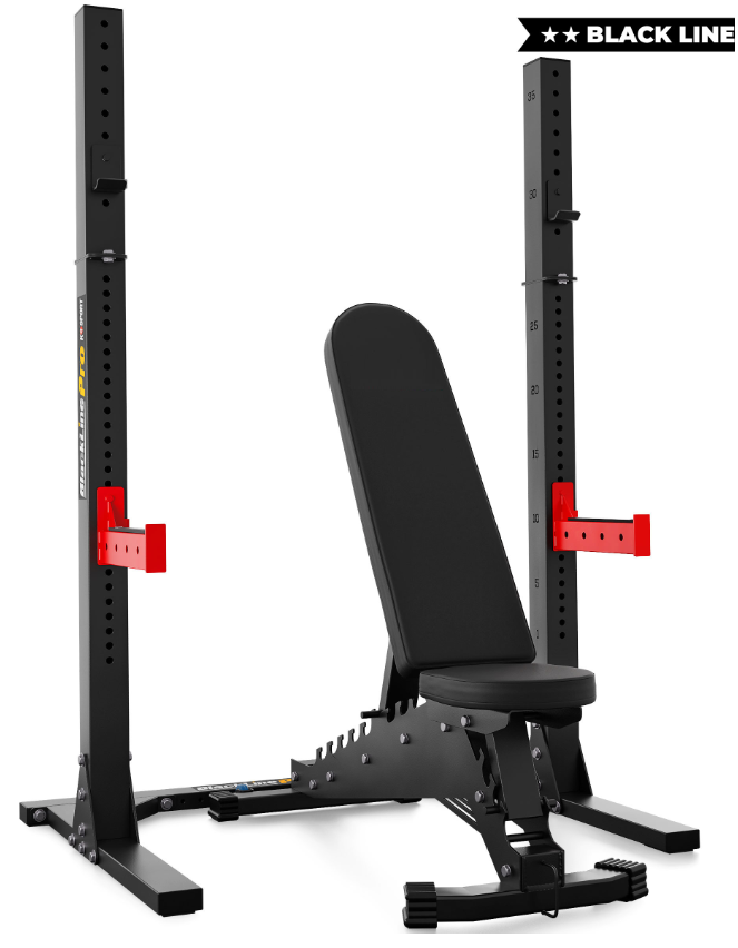 Black weight bench with red accents on a white background