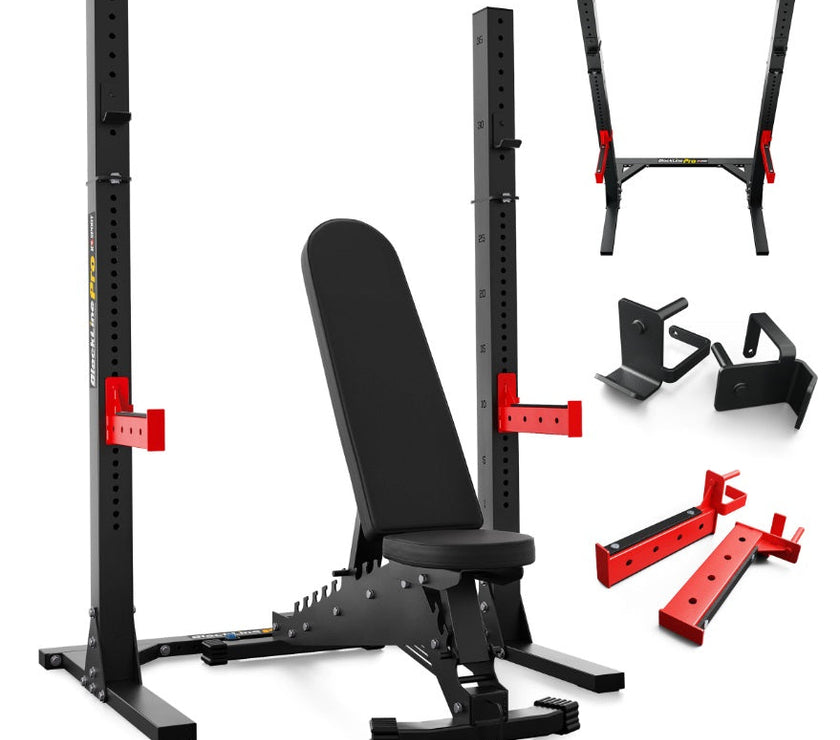 Black weight bench and squat rack with attachments on a white background