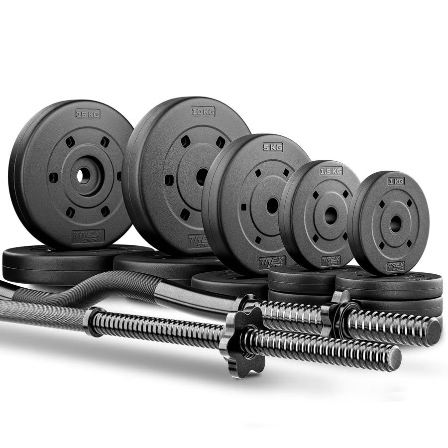 Set of weight plates and barbell on a white background