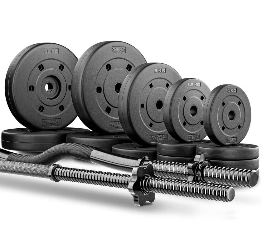 Set of weight plates and barbell on a white background