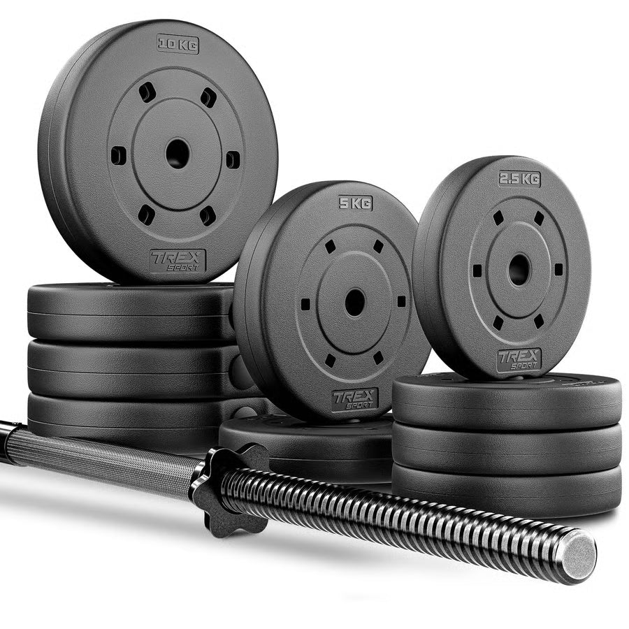 Set of weight plates and barbell on a white background