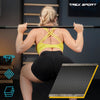 Woman performing a pull-up on a bar with a TREX Sport logo in the background