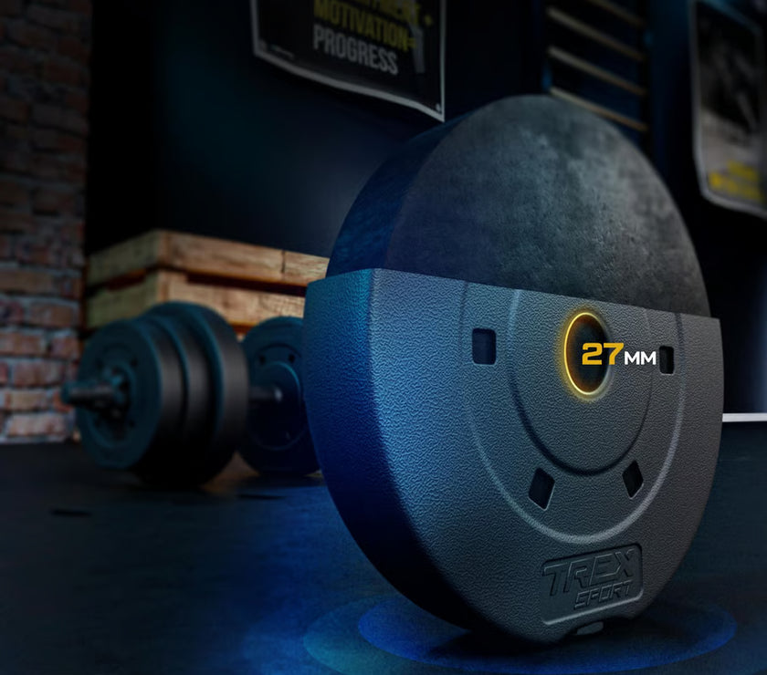 Close-up of a TRex Sport weight plate with gym equipment in the background