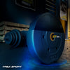 Blue dumbbell with '27' marking on a blurred gym background