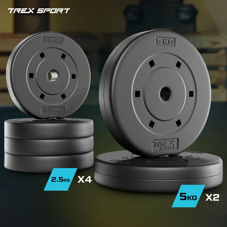 Stacks of gym weight plates with 'TREX Sport' branding on a dark background