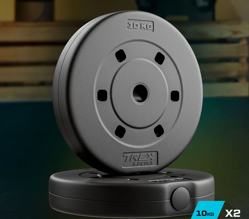Two gray weight plates with 'TREX Sport' branding on a blurred background