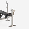 Træningsbænk med stativer og moduler til biceps og ben gym4all
